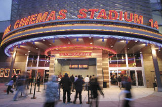 Moviegoers file into the new Regal Cinemas Stadium 14 The Landing Stadium 14; the grand opening was Friday.