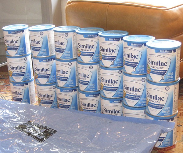 Renton Police officers recovered 200 cans of stolen baby formula from a Renton woman's home Thursday morning.