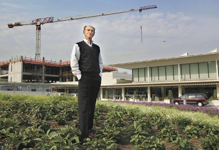 Valley Medical Center CEO Rich Roodman stands in front of the hospital's Emergency Services tower in September 2008 that is now just a few months away from opening.