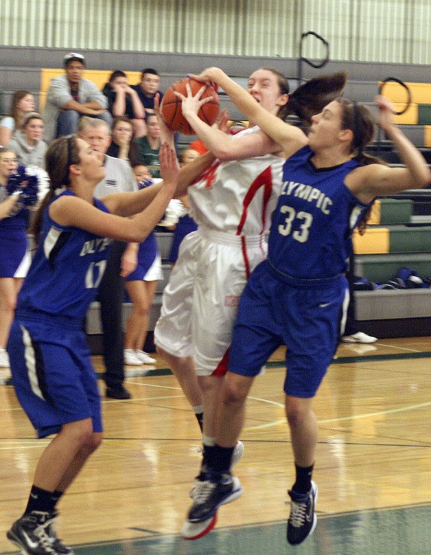Renton's Taylor Farris goes up for a shot against Olympic Feb. 17.