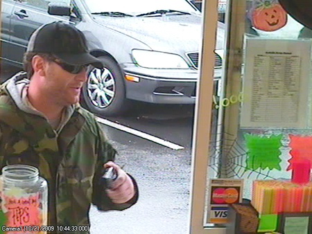 This man is being sought by the Renton Police Department in connection with a robbery of the Simply Espresso stand on Oct. 20. The department released the photo on Thursday.