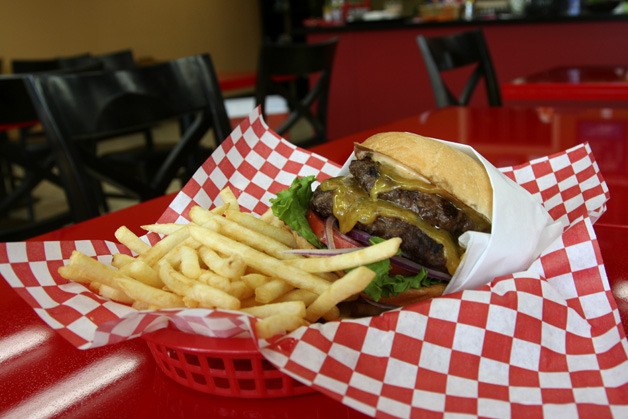 This double cheese burger has two third-pound beef patties grilled fresh at Burger Town. The gourmet burger shop opened last month as the only burger joint in downtown Renton.