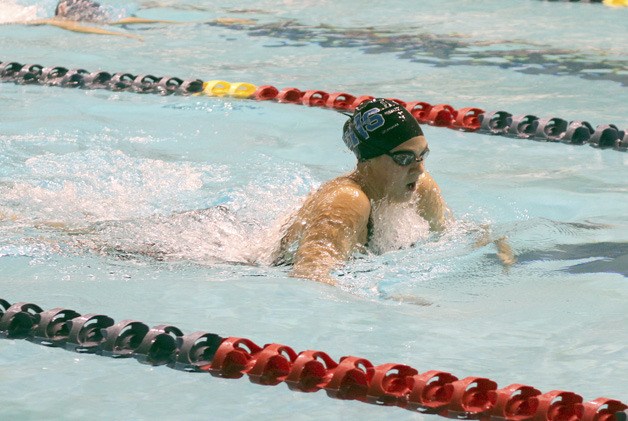 Liberty's Mackenna Briggs swims and the 3A state swim and dive meet.