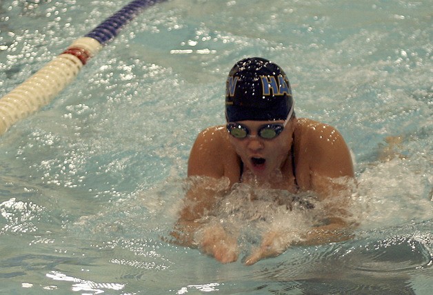 Hazen's Leah Maier swims in the 200-yard medley relay at districts.