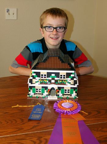 Tim Baggenstos of Fairwood won the grand championship in Lego building youth division at the Washington State Fair with this Swiss chalet.