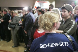 Tara Babcock of Renton wears a T-shirt that she said represented what Republicans 'are all about