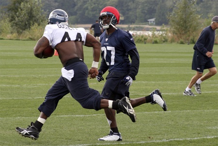 T.J. Duckett in a drill during training camp at the VMAC in Renton.