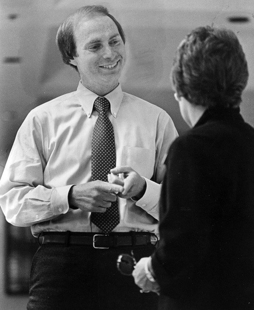 Rich Roodman stops to visit  while walking through Valley General Hospital in June 1983.