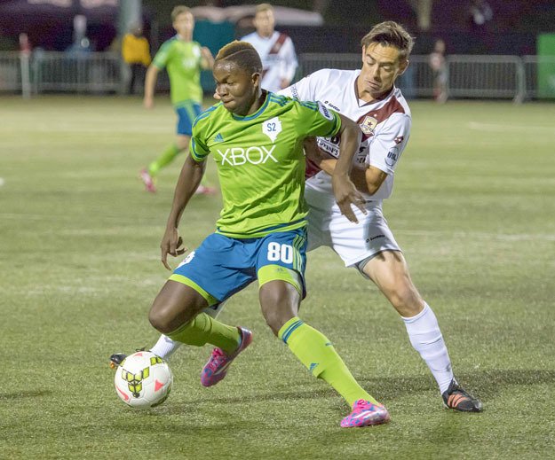 Midfielder Victor Mansaray  holds off a defender in S2’s 4-2 victory over Sacramento Republic FC on March 21.