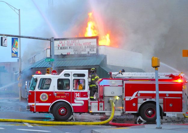 An early morning blaze engulfed a building containing three businesses at Main Ave. S. and Bronson Way in Renton on July 23.