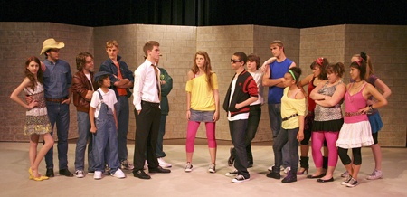 Youth pose in costume for the Summer Teen Musical