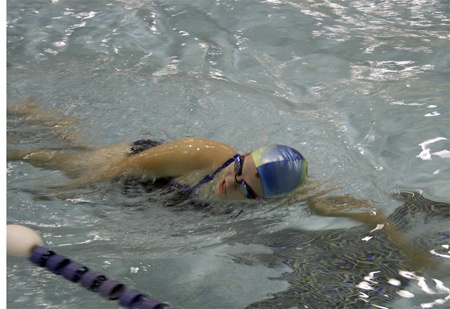 Renton High junior Carina Barnes swims a freestyle drill at practice at the Hazen pool.