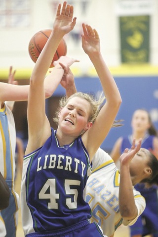 Liberty's Danni Sjolander is stripped by Hazen's Airashay Rogers