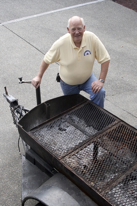 Don Persson keeps his barbecue trailer at home; he and business partner Larry Sleeth have a busy catering business and also donate their time.