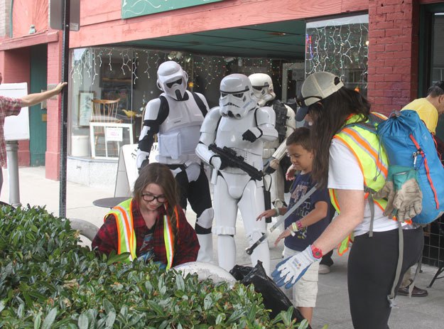 Stormtroopers from the 501st Legion supervise as Samantha Granquit
