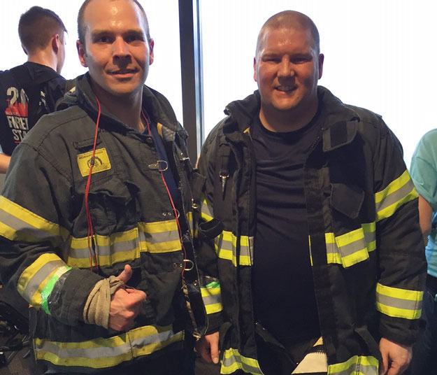 Renton firefighters Chris Krystofiak and Nick Bushnell are all smiles after completing the 69-story Scott Firefighter Stairclimb on March 6.