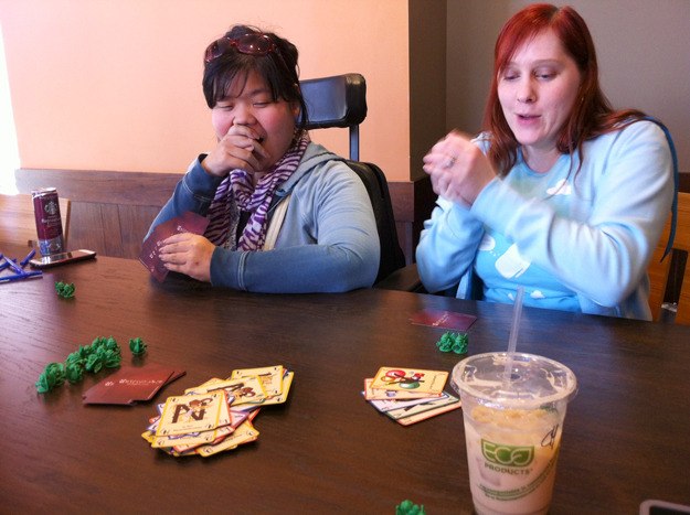 Danielle Harada and Melody Crevoiserat play a game of 'Unspeakable Words
