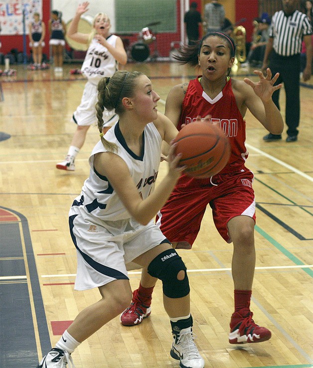 Lindbergh's Sarah Radulovich looks to pass out of trouble against Renton.