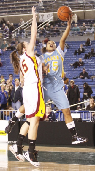 Hazen's Airashay Rogers puts up a shot against Lakeside in the first round of the 3A state basketball tournament March 11.