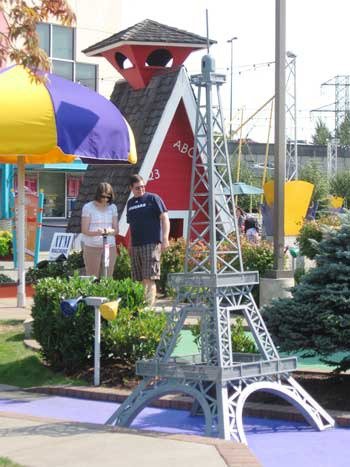 Wendy and Daniel Jones contemplate angles during an afternoon round of mini golf at the Family Fun Center.