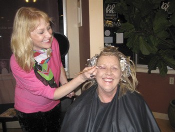 Salon owner Cheryl Danza of CD Danza Salon and Spa helps Karen Warner of Lakeridge perfect a look that’s sure to inspire some Valentine’s Day plans.