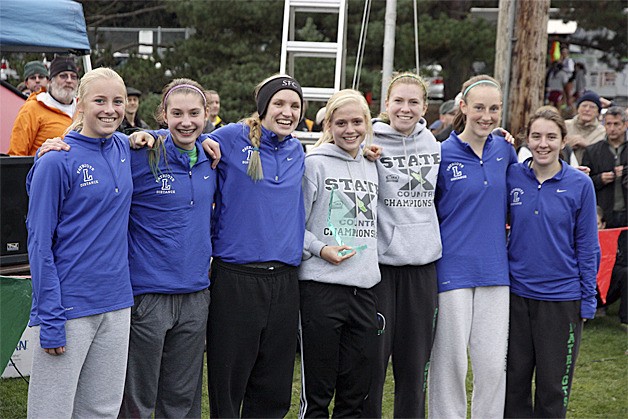 Liberty girls cross-country team after winning a third straight Sea-King district title.