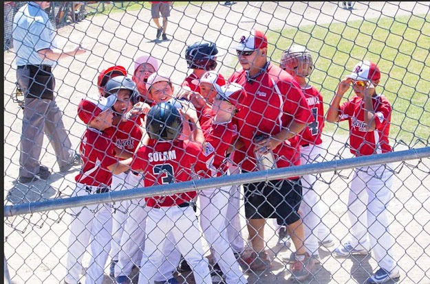 Members of Renton Little League celebrate a win this past weekend.