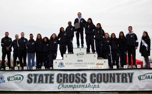 The Lindbergh girls cross country team poses with their fourth-place award.