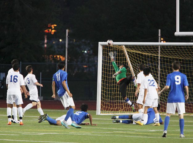 The winning goal drifts just over the outstretched hand of Hazen Goalie Luis Rodriguez during the May 12 match-up at Renton Memorial Stadium.