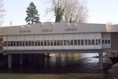 The Renton Public Library has stood over the Cedar River on Mill Avenue for decades.
