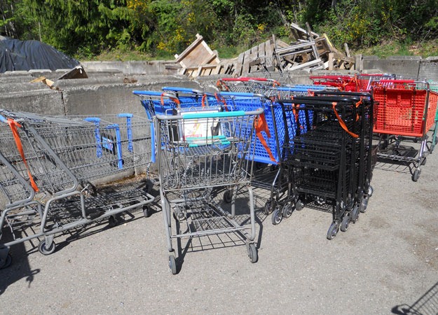 Abandoned shopping carts stored by the city.