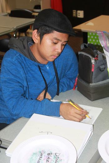 Renton High School junior Justin Apolonio is one of 52 students pursuing an International Baccalaureate Diploma for the school's new program.
