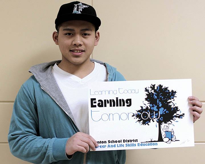 Renton High School senior Tony Lee holds the winning poster he designed for this year's Renton School District Career and Life Skills Education poster contest.