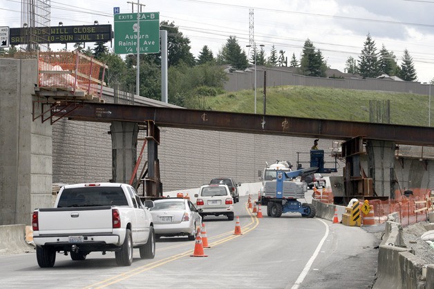 Crews are readying two piers in preparation to placing the girders for a new southbound I-405 offramp to Talbot Road South. The girders will be placed July 12 and 13
