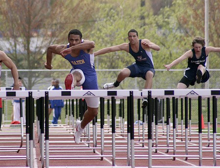 Hazen's James Holland competes in the 110-meter hurdles at a meet April 1.