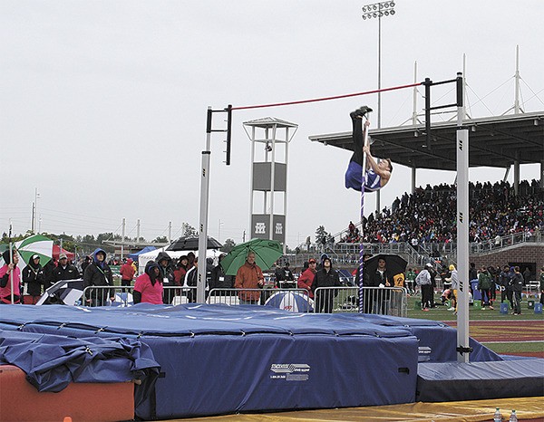 Hazen’s Spencer Shear vaults to a third-place finish at the 3A state track meet at Mount Tahoma High School. Several Highlanders placed well in the competition.