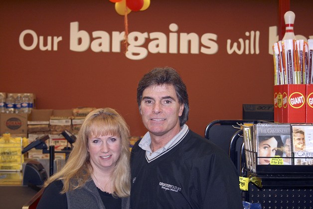 Erin and Jeff McNeil are the owners of the new Grocery Outlet in the Renton Highlands.