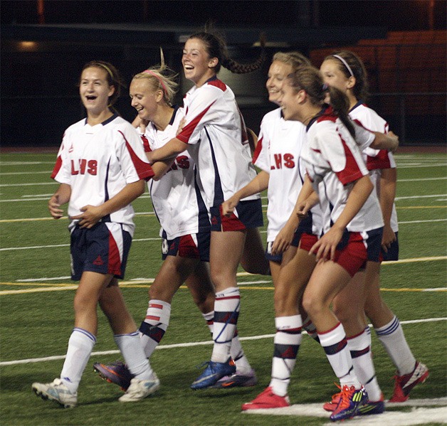 The Lindbergh girls soccer team celebrates after beating Kennedy Catholic Tuesday night.