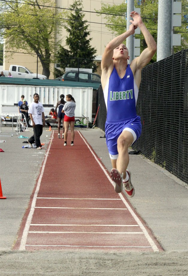 Liberty's Josh Gordon competes in the triple jump at the SeaKing meet May 16.