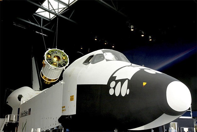 The NASA Space Shuttle Trainer in The Museum of Flight Charles Simonyi Space Gallery. Above the Trainer’s cargo bay looms a replica of the Boeing Inertial Upper Stage satellite booster.
