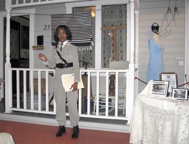 Storyteller Eva Abram addresses a captivated audience at the Renton History Museum in her performance as Bessie Coleman