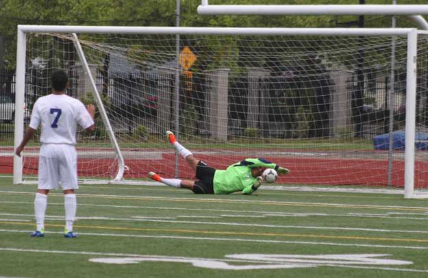 Hazen senior keeper Freddy Jeronimo makes a save during the first half of Saturday's 4-1 loss to Shorecrest.