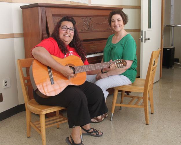 Darlene Rose and Lizabeth Diaz hope to expose students to new keyboard and guitar classes this fall at Renton High School.