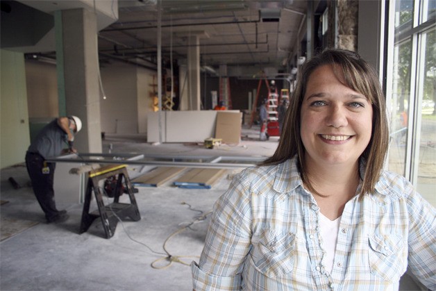 Pastor Gretchen Mertes stands in what will eventually become Luther’s Table