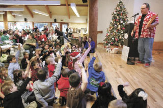 Devin Reynolds performs to a sold-out crowd at the “Breakfast with Santa