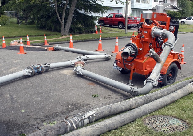 Index Avenue in the Tiffany Park neighborhood played host to a tangle of pipes and a pump Friday as the City of Renton diverted sewage around about 1