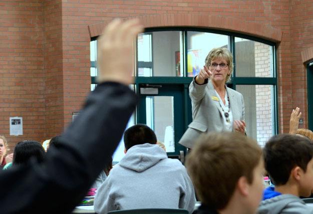 Superintendent Merri Rieger takes questions from McKnight Middle School students during her first year in the district.