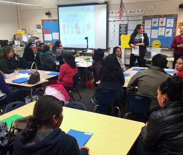 Parents at a recent Parent Academy for Student Achievement night learn from each other's experience.