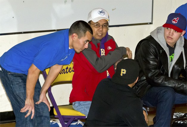 Hazen wrestling coach Rory Magana talks to his father Rodney