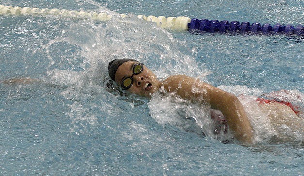 Renton's Lynhda Vuong swims at the 2A district meet Nov. 4.